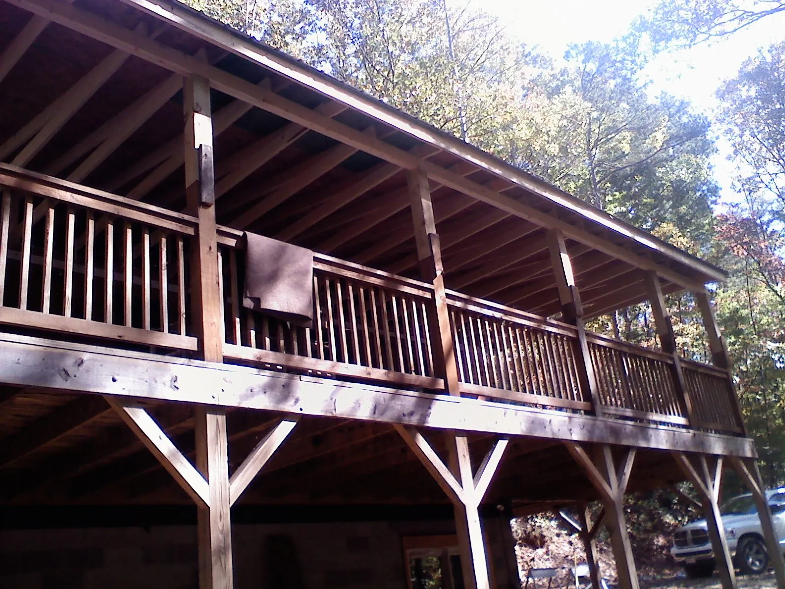Timber framing under a new elevated porch and deck — Roof Leak Repair in Preemption by Roofing Brothers